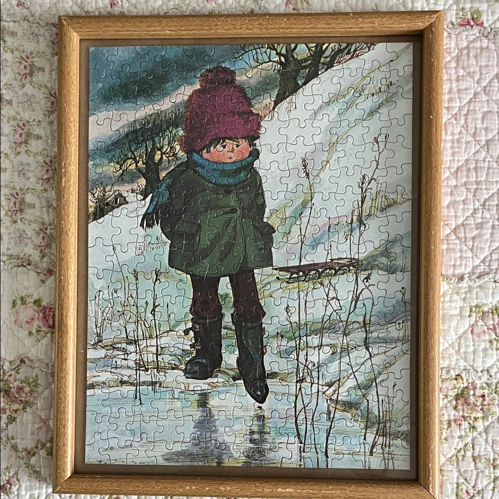 Vintage wood framed puzzle. Approx 14.5” x 11.5”. Winter scene of boy by a pond.